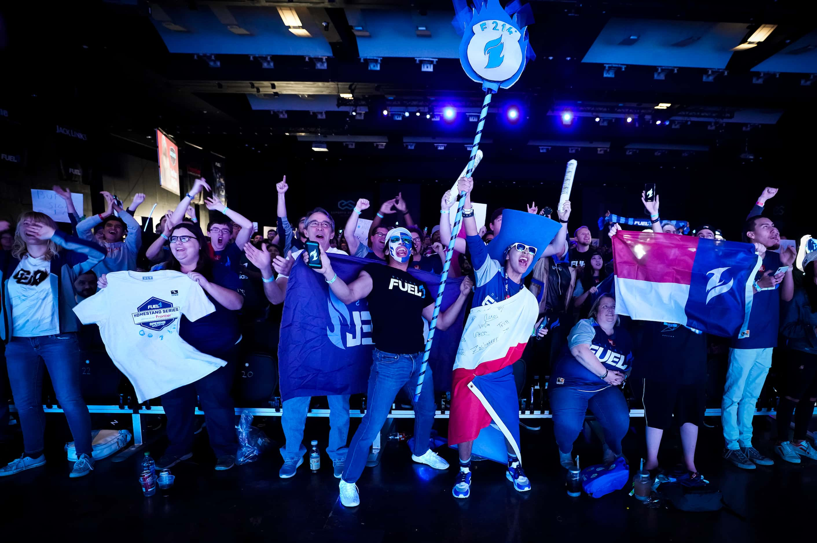 Dallas Fuel fans cheer their team before the start of a Overwatch League match against the...