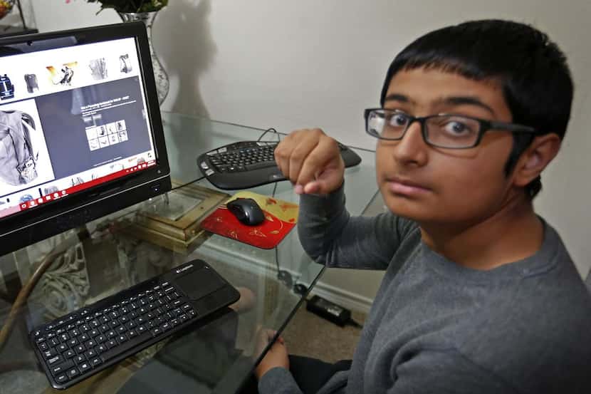 
Twelve-year-old Armaan Singh poses for a photograph with an image of a backpack similar to...