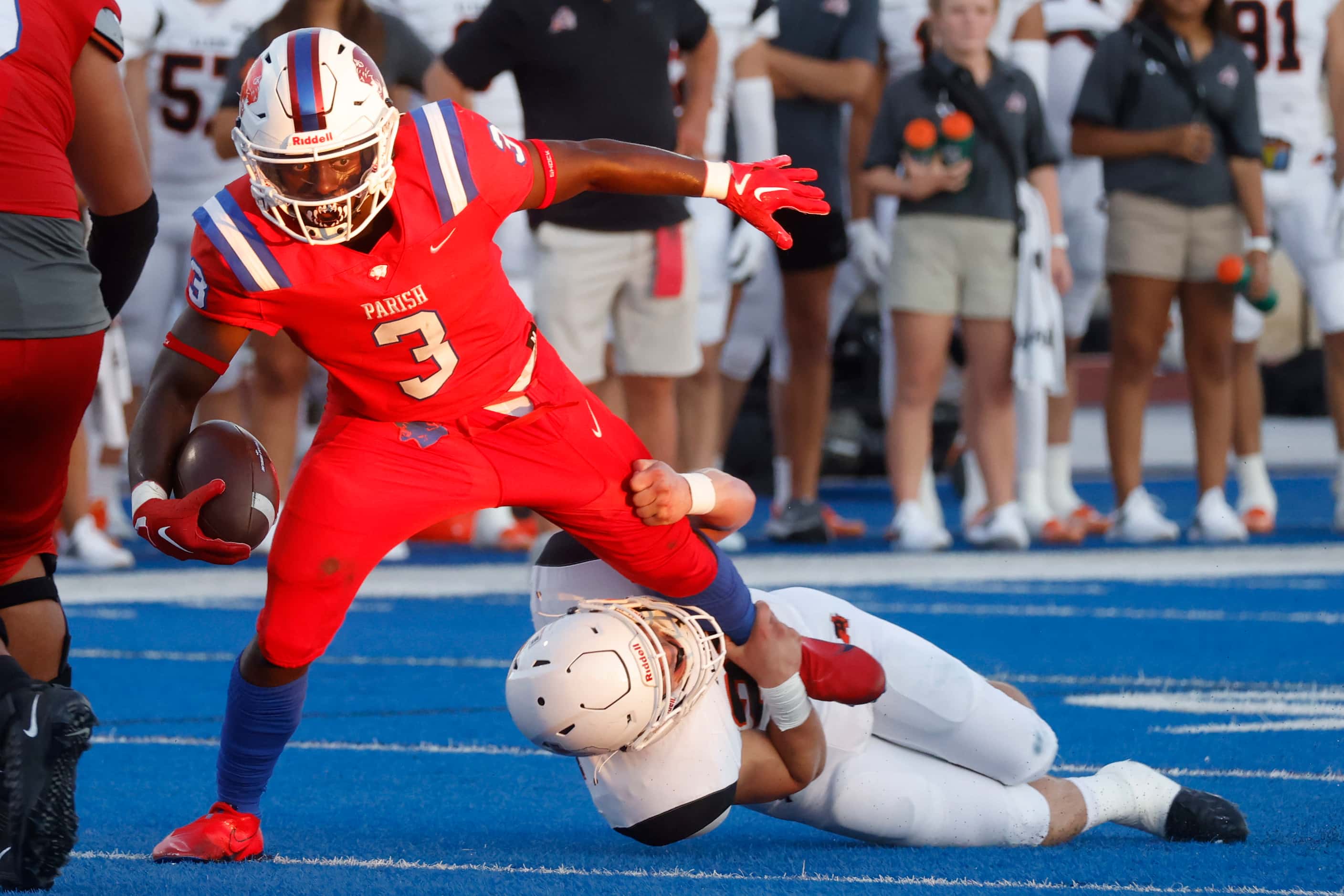 Aledo High’s Andrew Parkhurst, right, tackles Parish Episcopal’s Cedric Mays II during the...