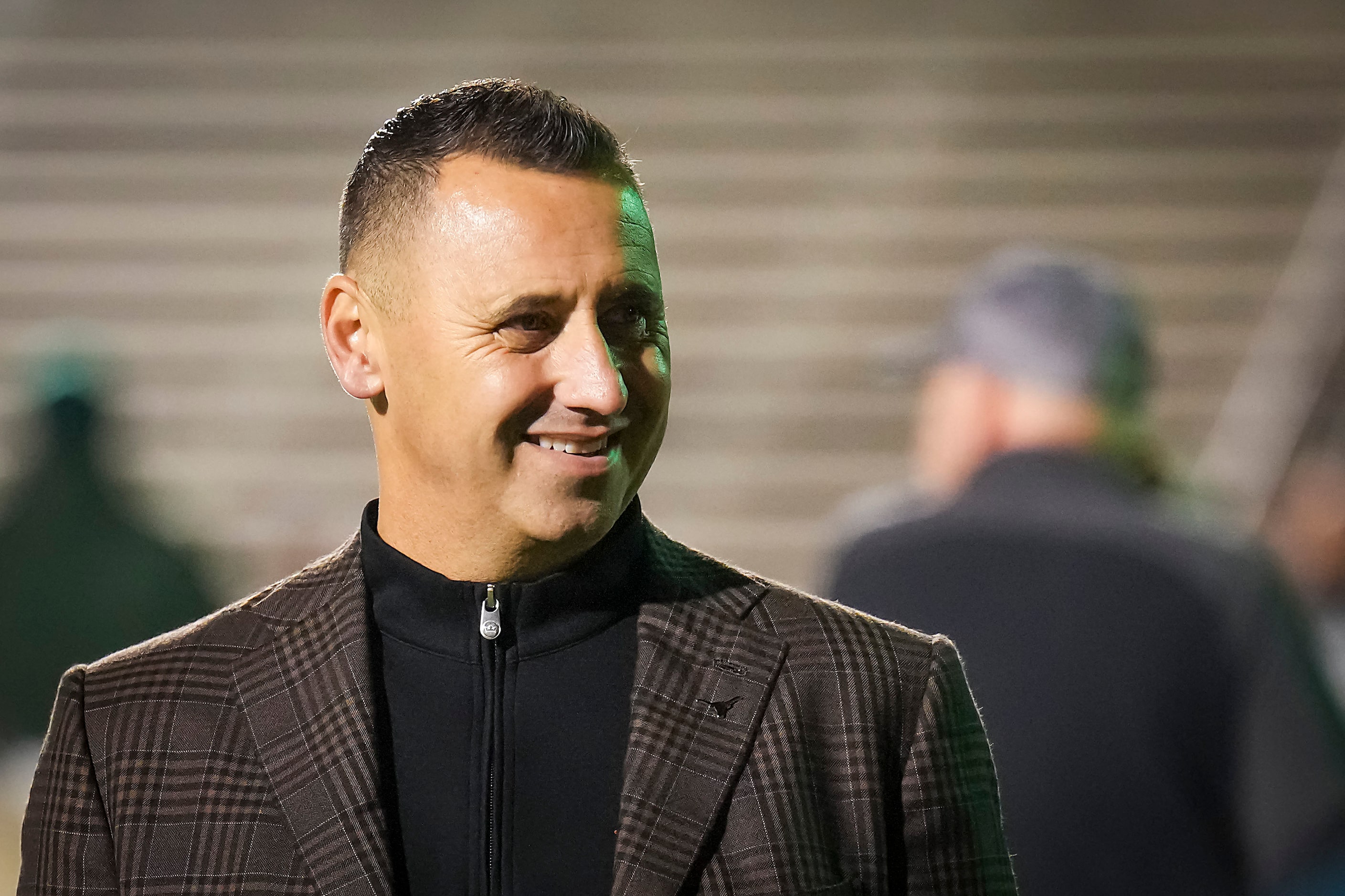 University of Texas head football coach Steve Sarkisian watches from the sidelines during...