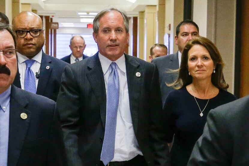 Republican Texas Attorney General Ken Paxton and his wife Angela Paxton, arrive for a...