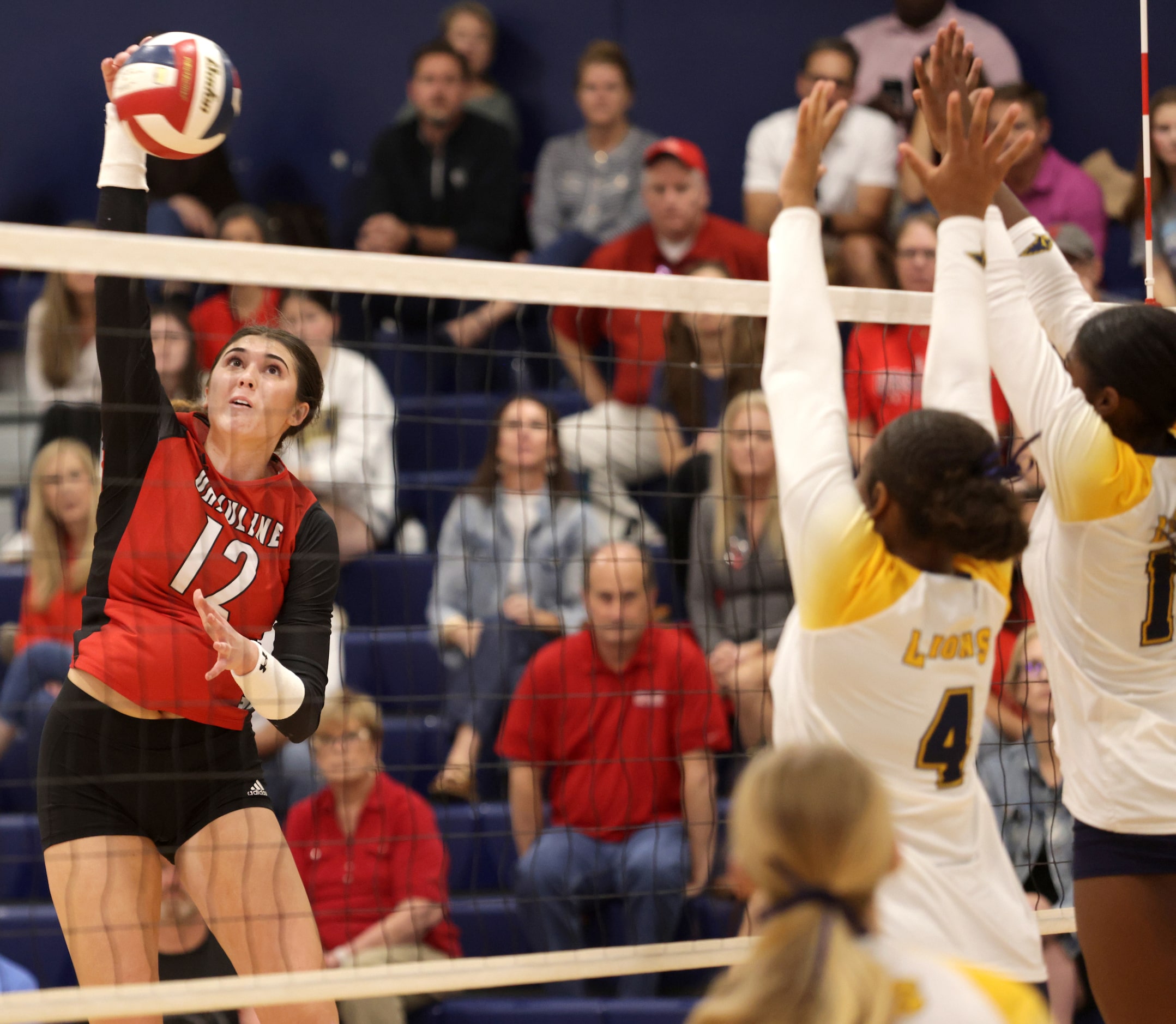 Ursuline player #12 Sophia Thornburg hits for the ball during the Ursuline Academy of Dallas...