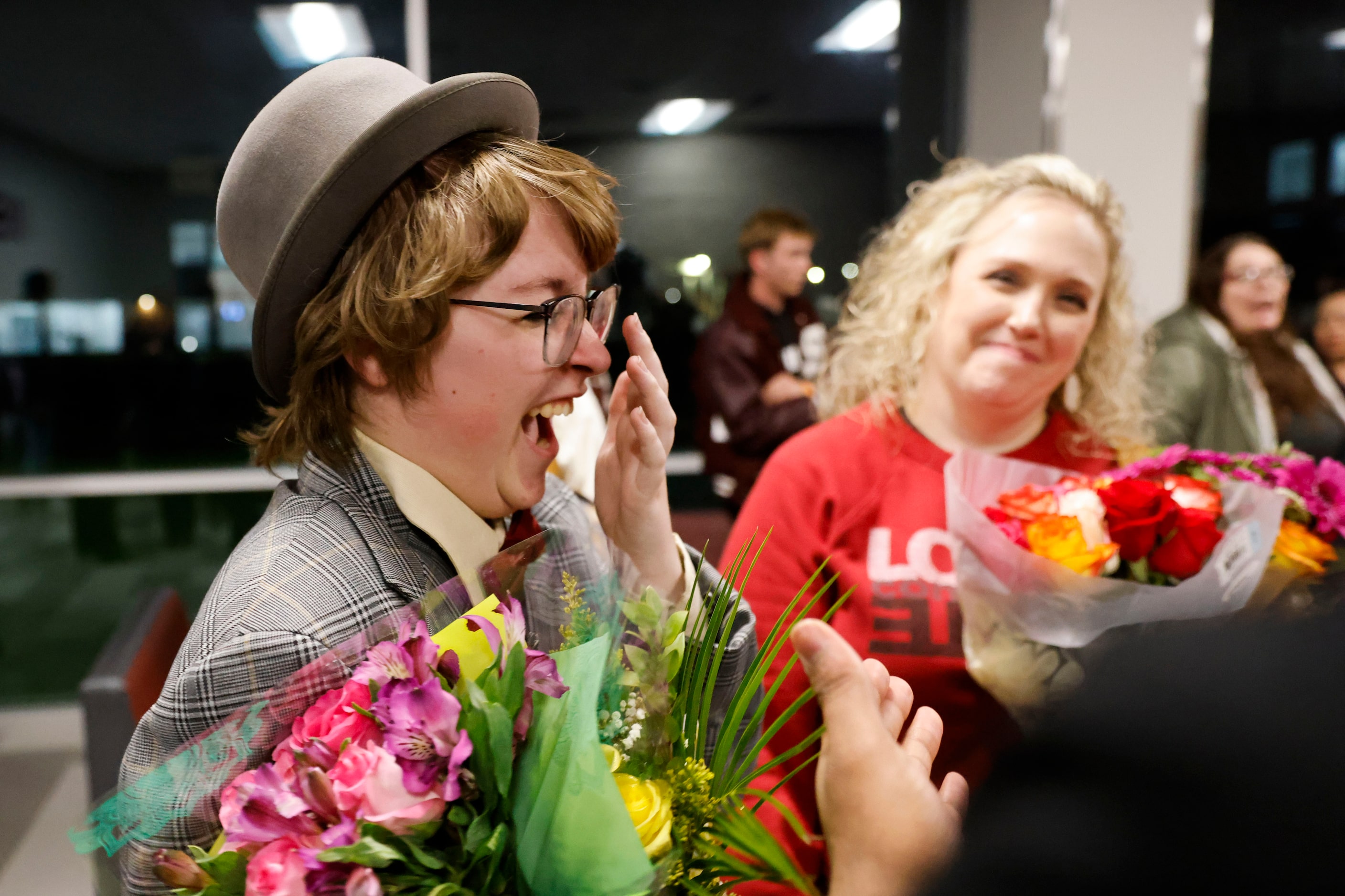 Cast member Max Hightower (left) reacts while getting congratulated by the crowd beside his...