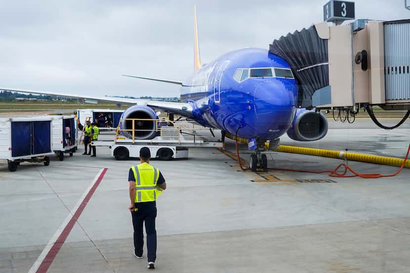Baggage is loaded onto a Southwest Airlines flight at Santa Barbara Municipal Airport on...