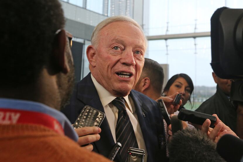 Jerry Jones talks with the media as he hosts a news conference and reception to announce new...