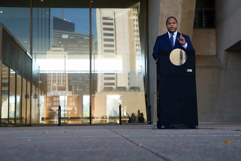 Mayor Eric Johnson speaks during a press conference in front of Dallas City Hall on...