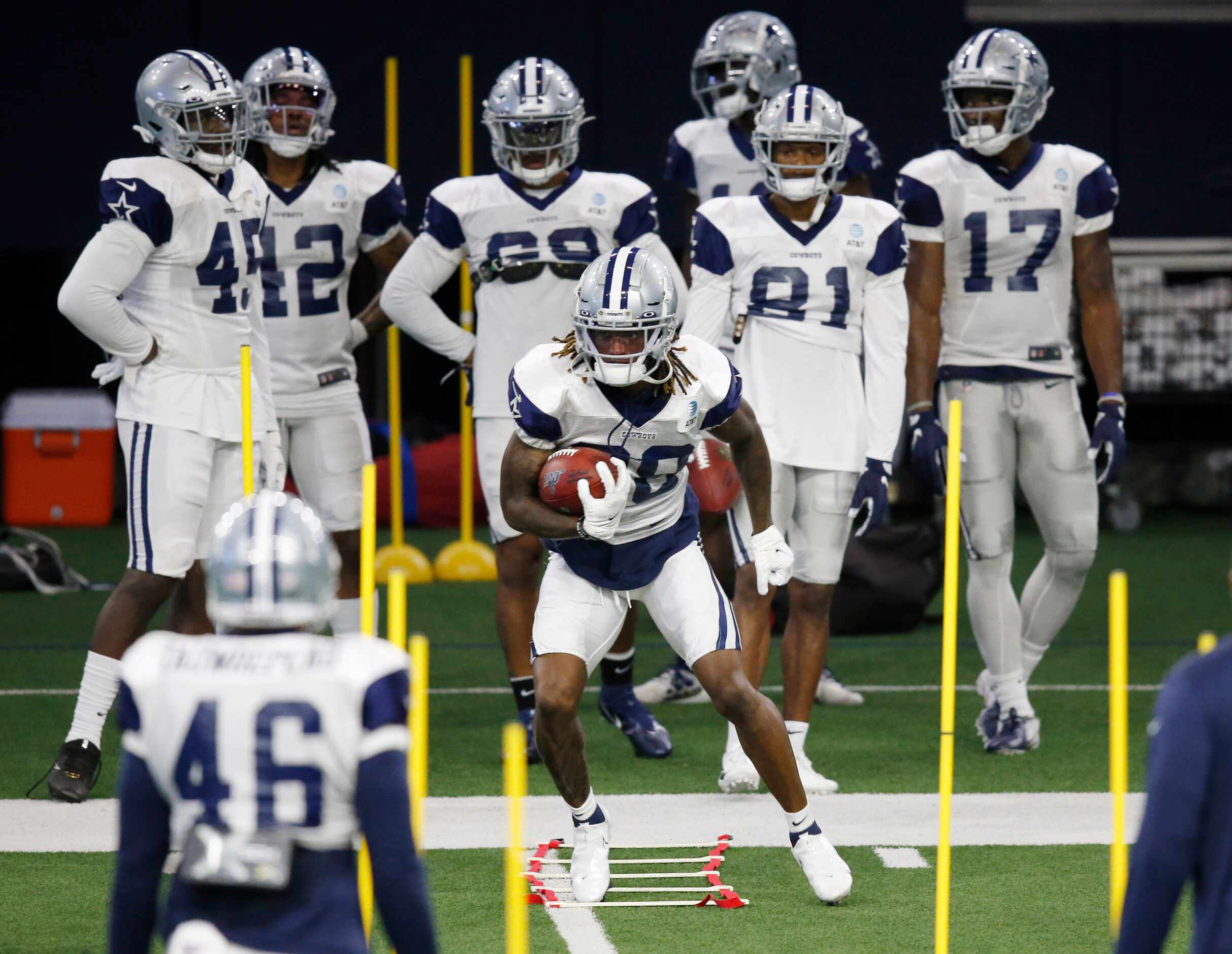 Dallas Cowboys wide receiver CeeDee Lamb (88) runs through a drill in practice during...