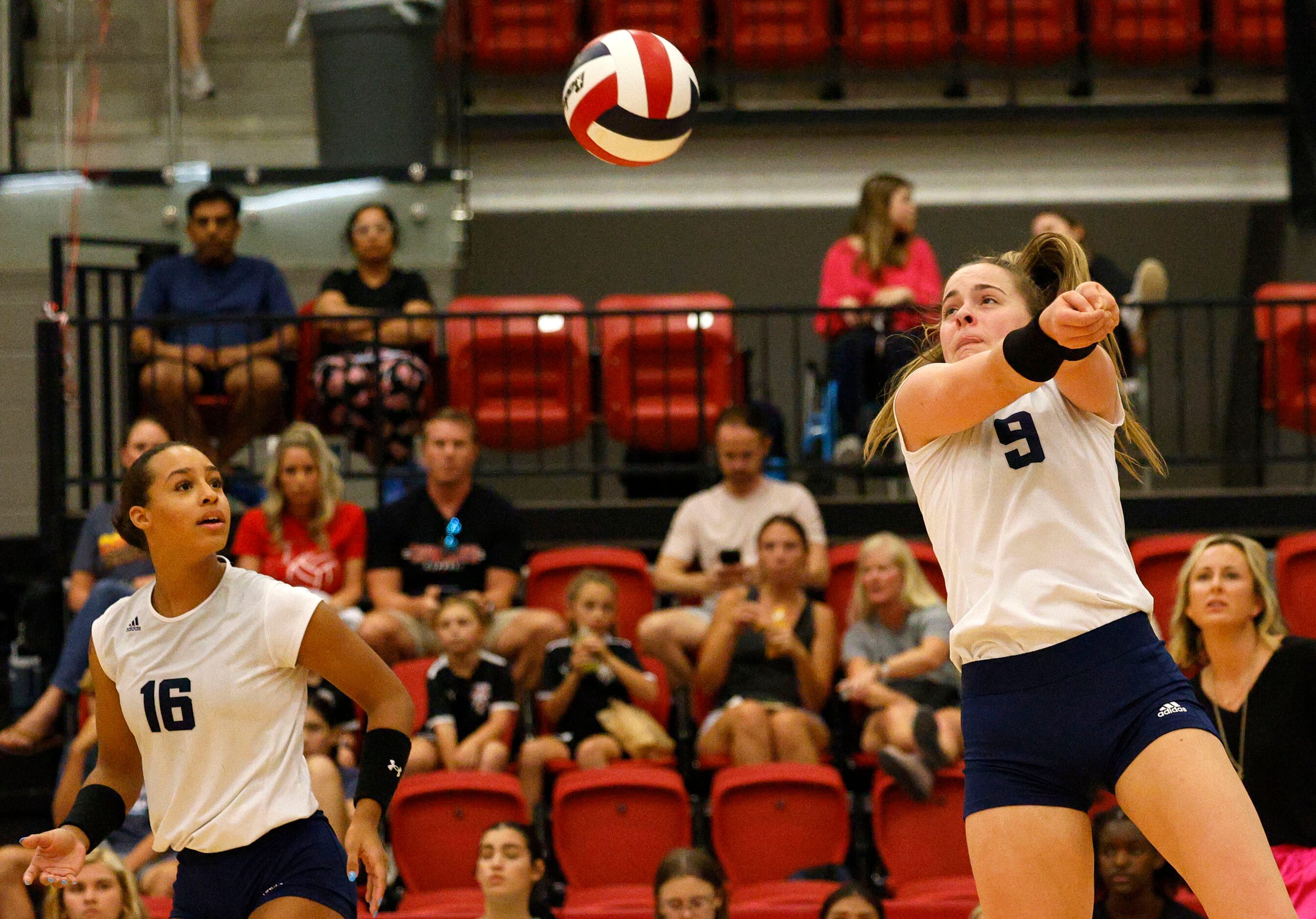 Flower Mound's Cat Young (9) digs the ball against Coppell as Flower Mound's Geli St....