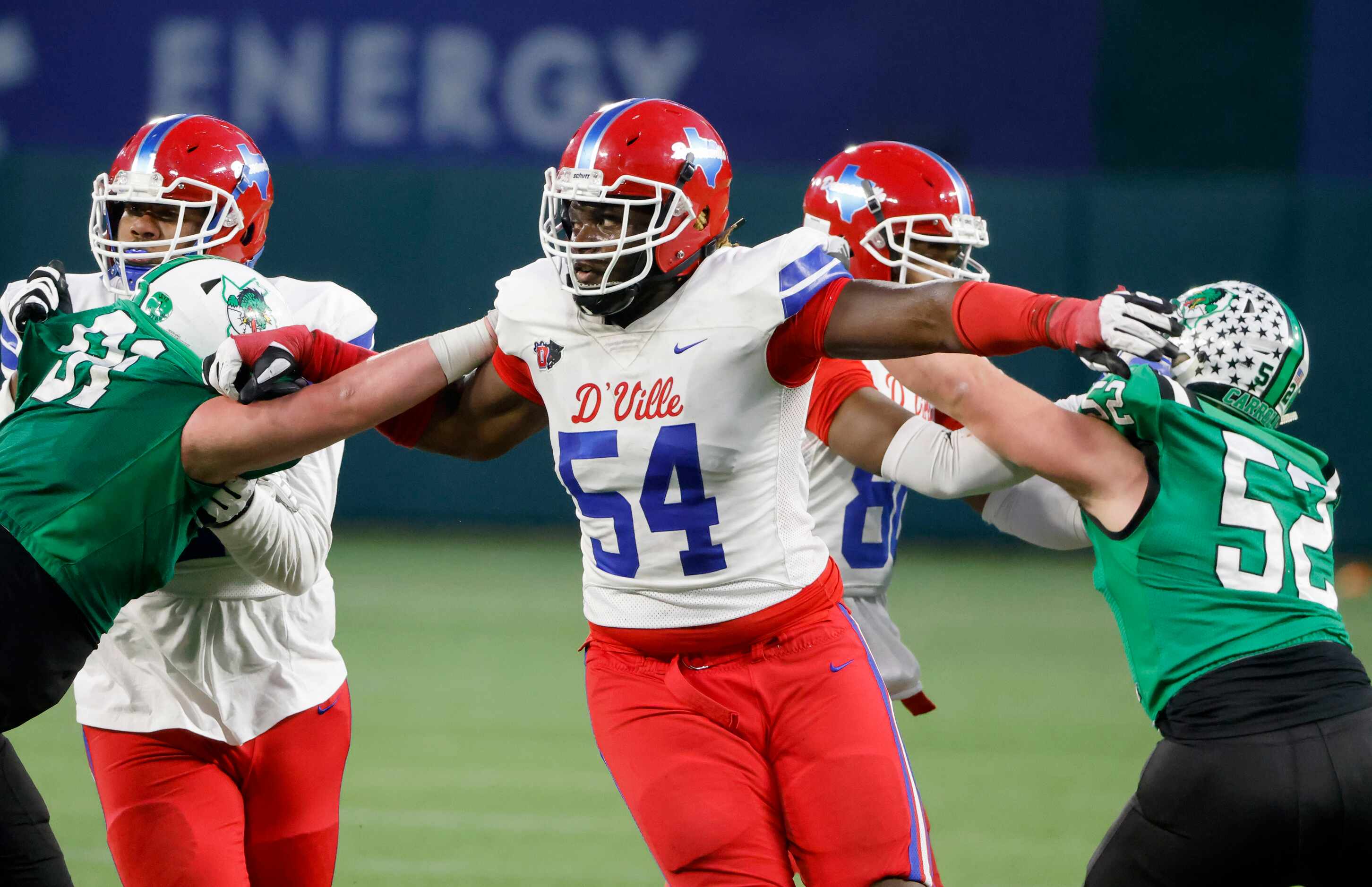 Duncanville’s Savion Byrd (54) tries to get past Southlake players during the Class 6A...