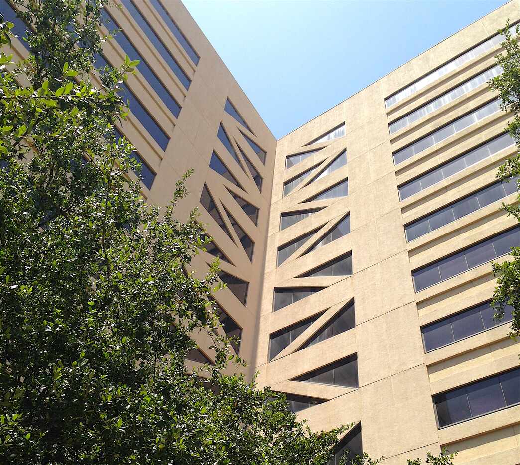 The 12-story Crossings office tower is getting a makeover with a repainted exterior.