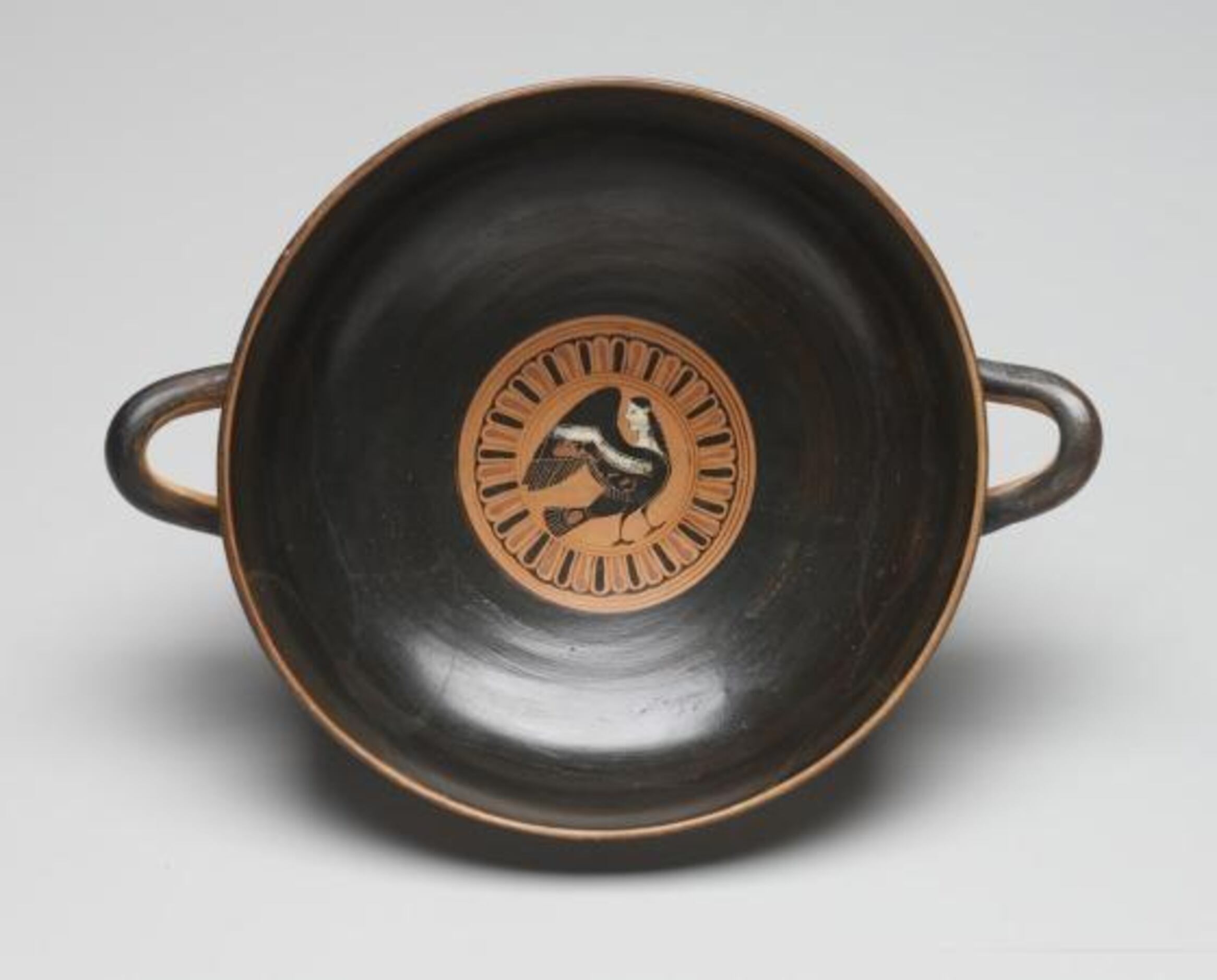 A black-figure kylix from 550 530 B.C. is among three ancient Greek ceramic vessels that...
