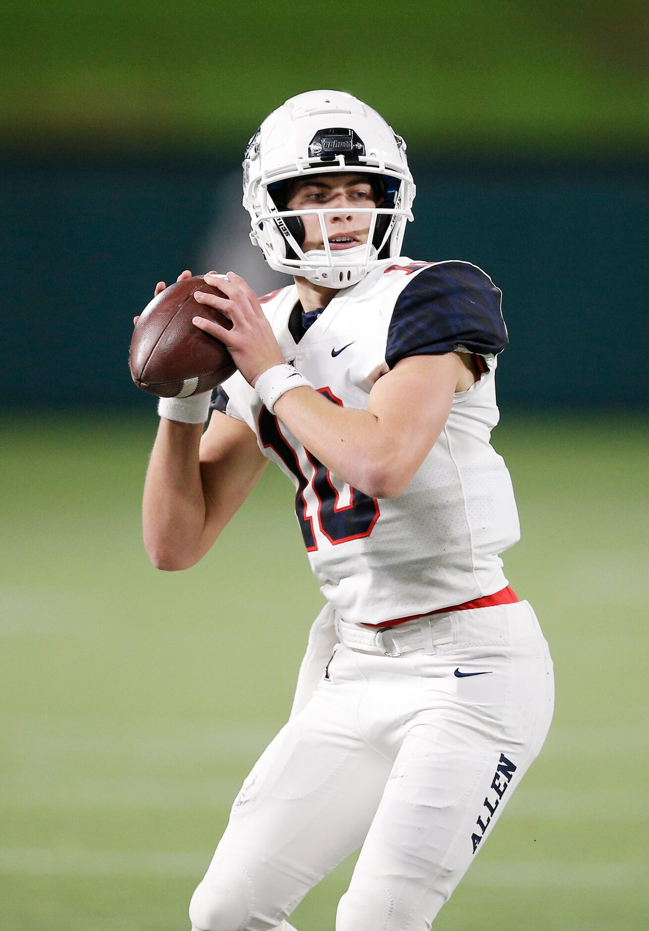 Allen senior quarterback General Booty (10) looks for an open receiver during the first half...