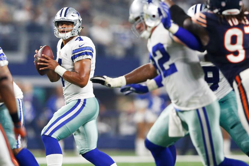 Dallas Cowboys quarterback Dak Prescott (4) before throwing a touchdown pass to Dallas...