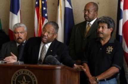  Preston K. Gilstrap (second from left), national board chair of the National Black Police...