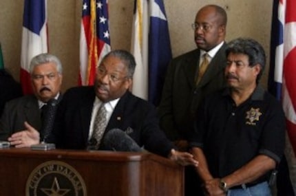  Preston K. Gilstrap (second from left), national board chair of the National Black Police...