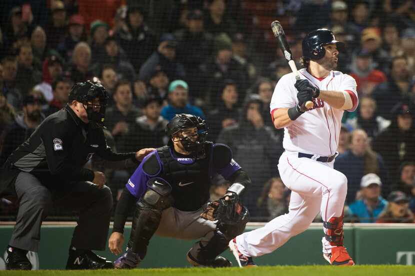 BOSTON, MA -  MAY 14: Mitch Moreland #18 of the Boston Red Sox hits a RBI single in the...