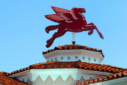 The Casa Linda Mobil Station with its lighted Pegasus and red tile roof has been a landmark...