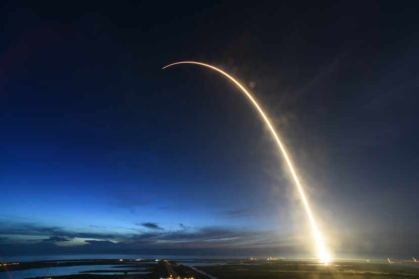 A SpaceX Falcon 9 rocket launched just before dawn Friday, June 29, 2018, is captured during...