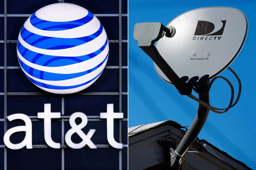 This file combo shows the AT&T logo on the side of a corporate office in Springfield, Ill.,...