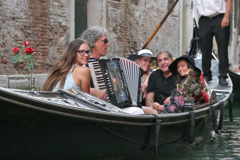 
When you visit Venice, don’t pass up a gondola ride, complete with a musician.


