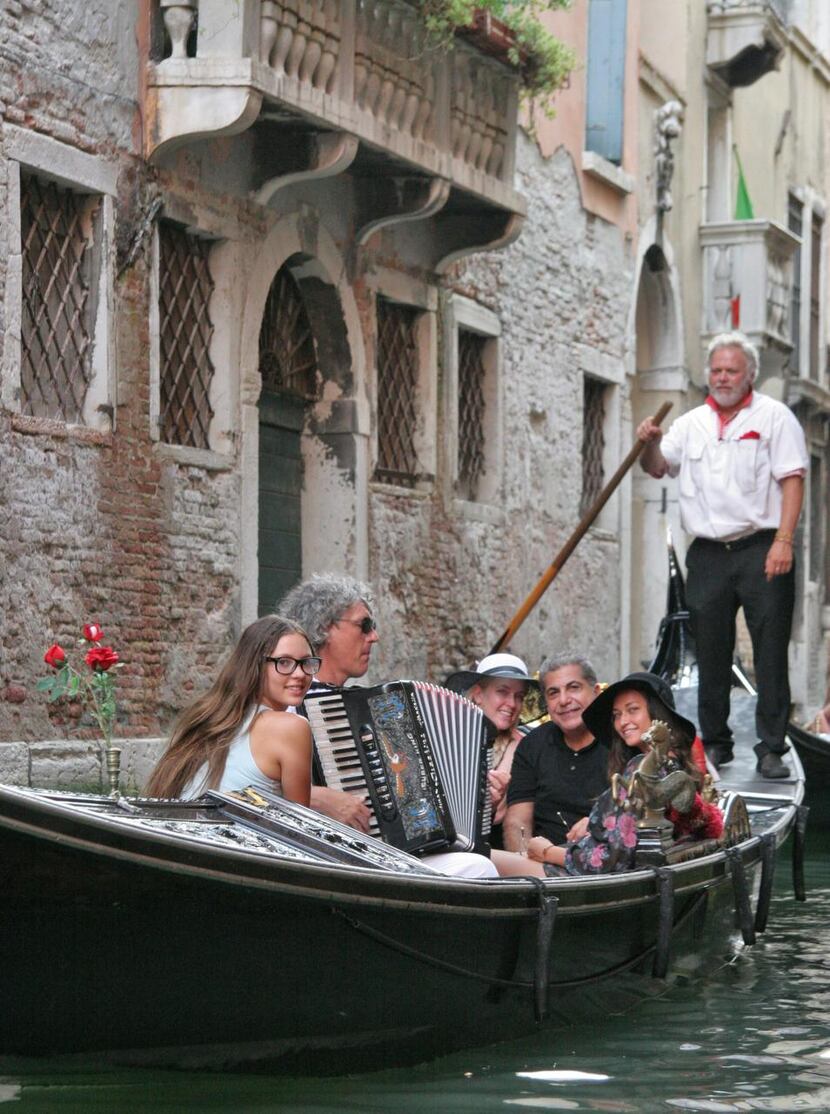 
When you visit Venice, don’t pass up a gondola ride, complete with a musician.


