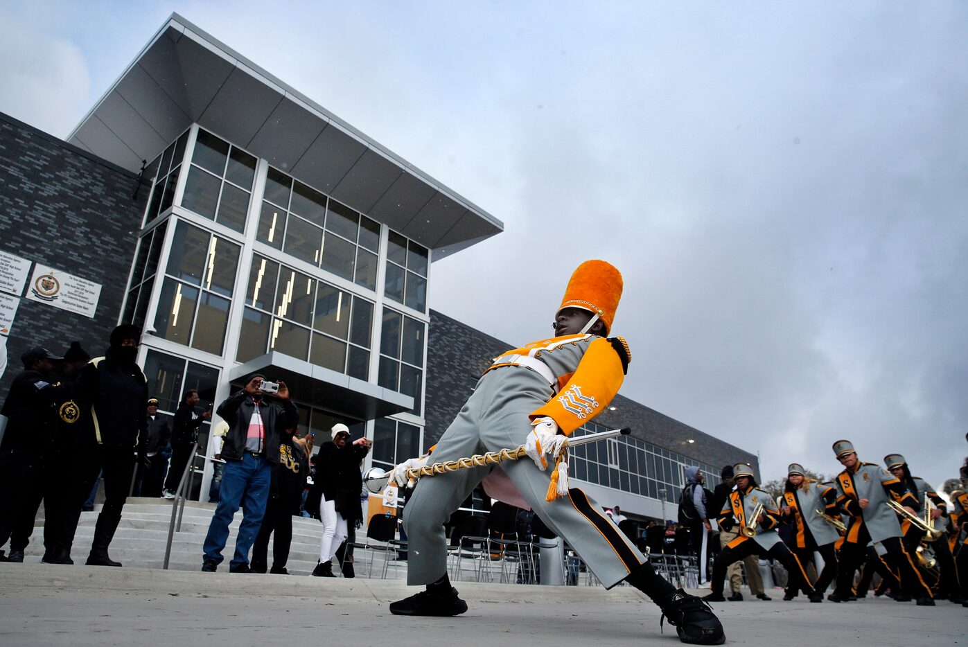 Drum major Javari Simmons performs with the Nu Soul of the South marching band in front of...