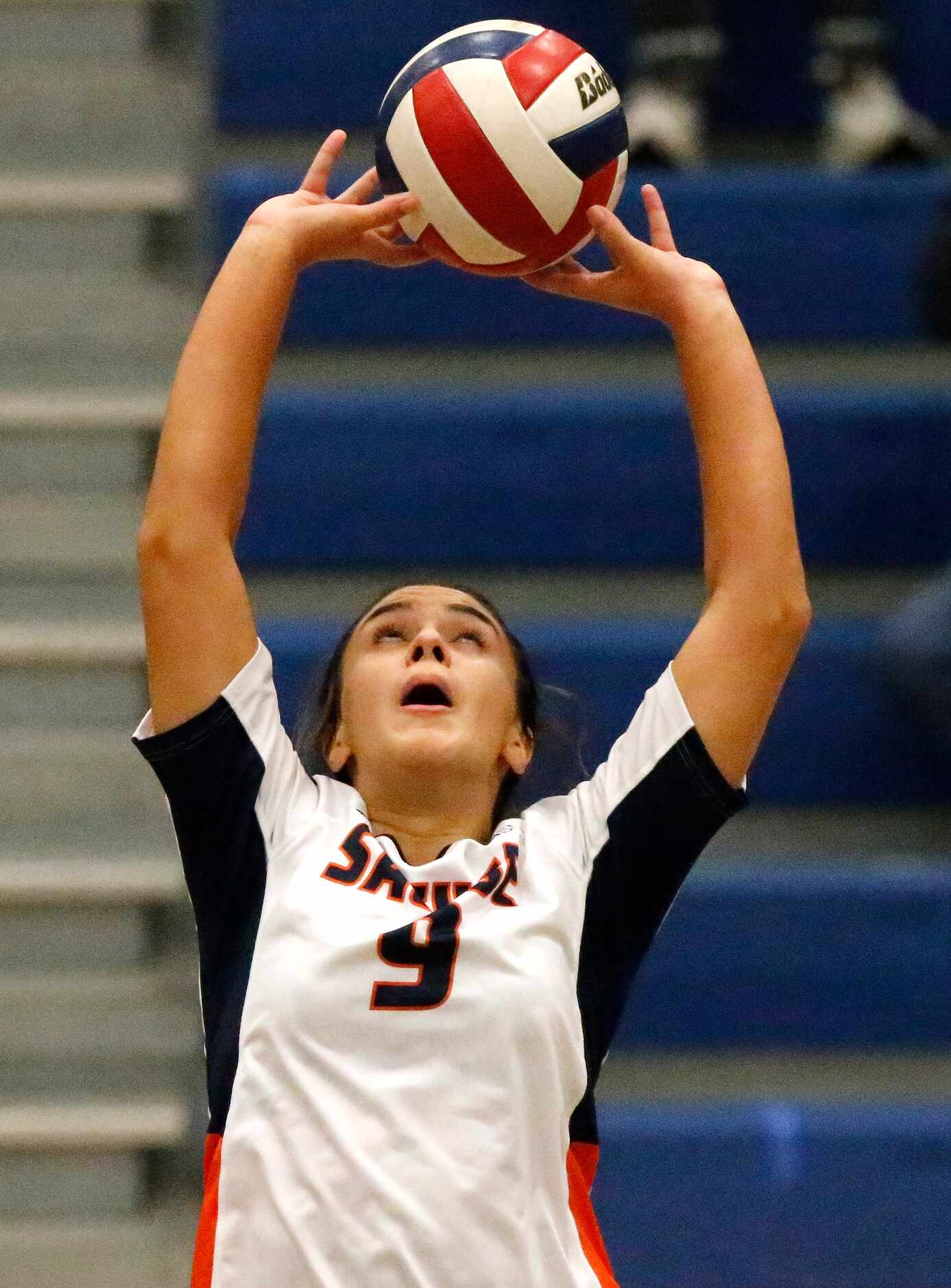 Sachse High School setter Claire Romo (9) makes a set during game one as Sachse High School...