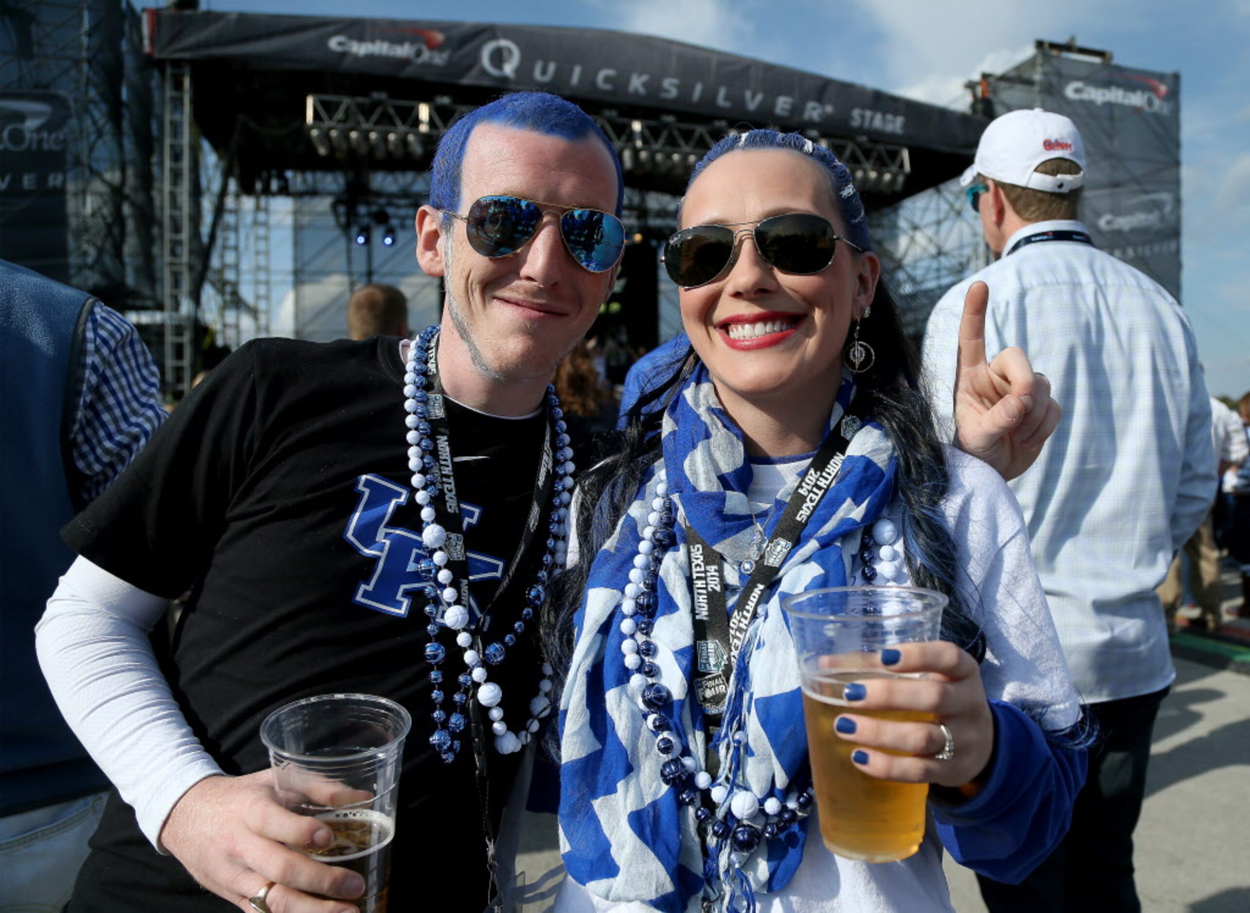 Kentucky fans Zac and Amber Sullivan from Henderson, KY, pose in the Tip-Off Tailgate...