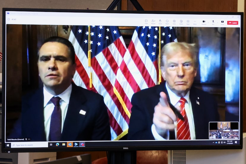 President-elect Donald Trump, right, appears remotely with attorney Todd Blanche for a...