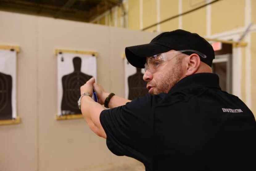 
Robbie Allmon instructs a women's self-defense class at Patriot Protection in Plano.

