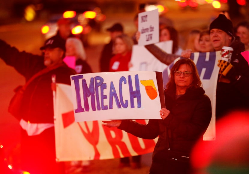 Supporters of U.S. Representative Colin Allred gathered outside his Richardson, Texas office...