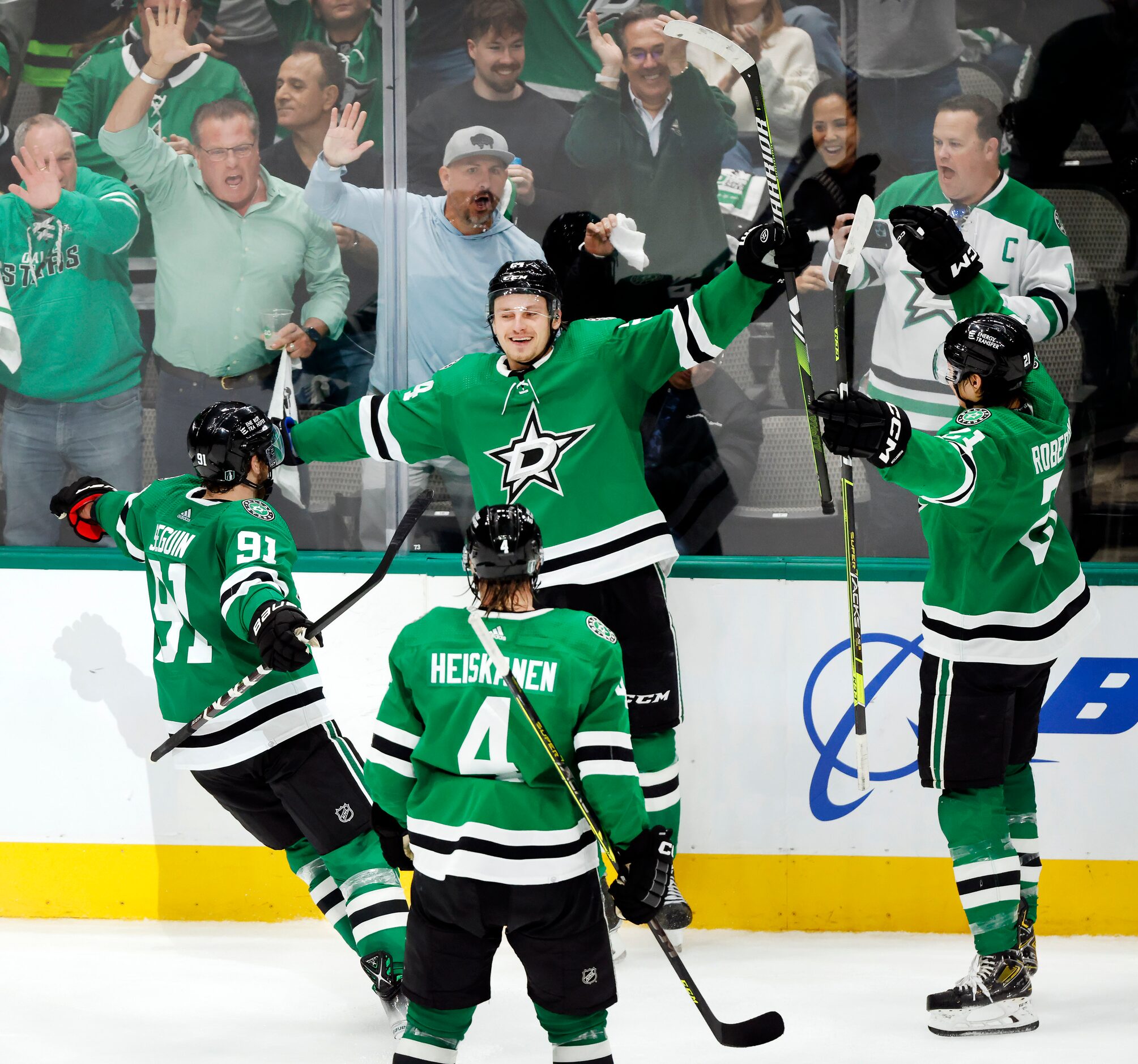 Dallas Stars center Roope Hintz (24) is congratulated by teammates following his second...