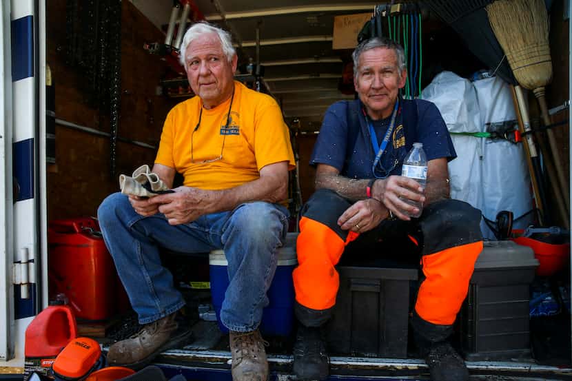 Members of Texas Baptist Men Bob Williams, left, of Josephine, Texas, and Don Stansell,  of...