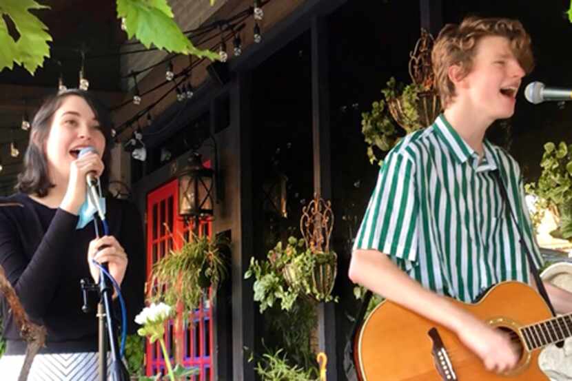 Local singers Sam Wood and Olivia Hughes are shown performing at Sweet Firefly in the II...