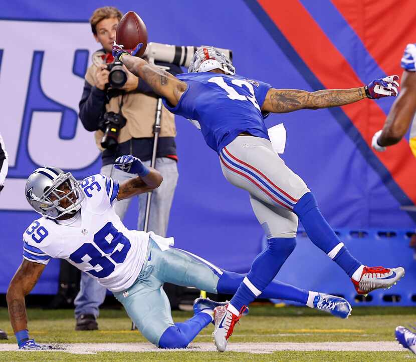 Despite the pass interference by Dallas Cowboys cornerback Brandon Carr (39), New York...