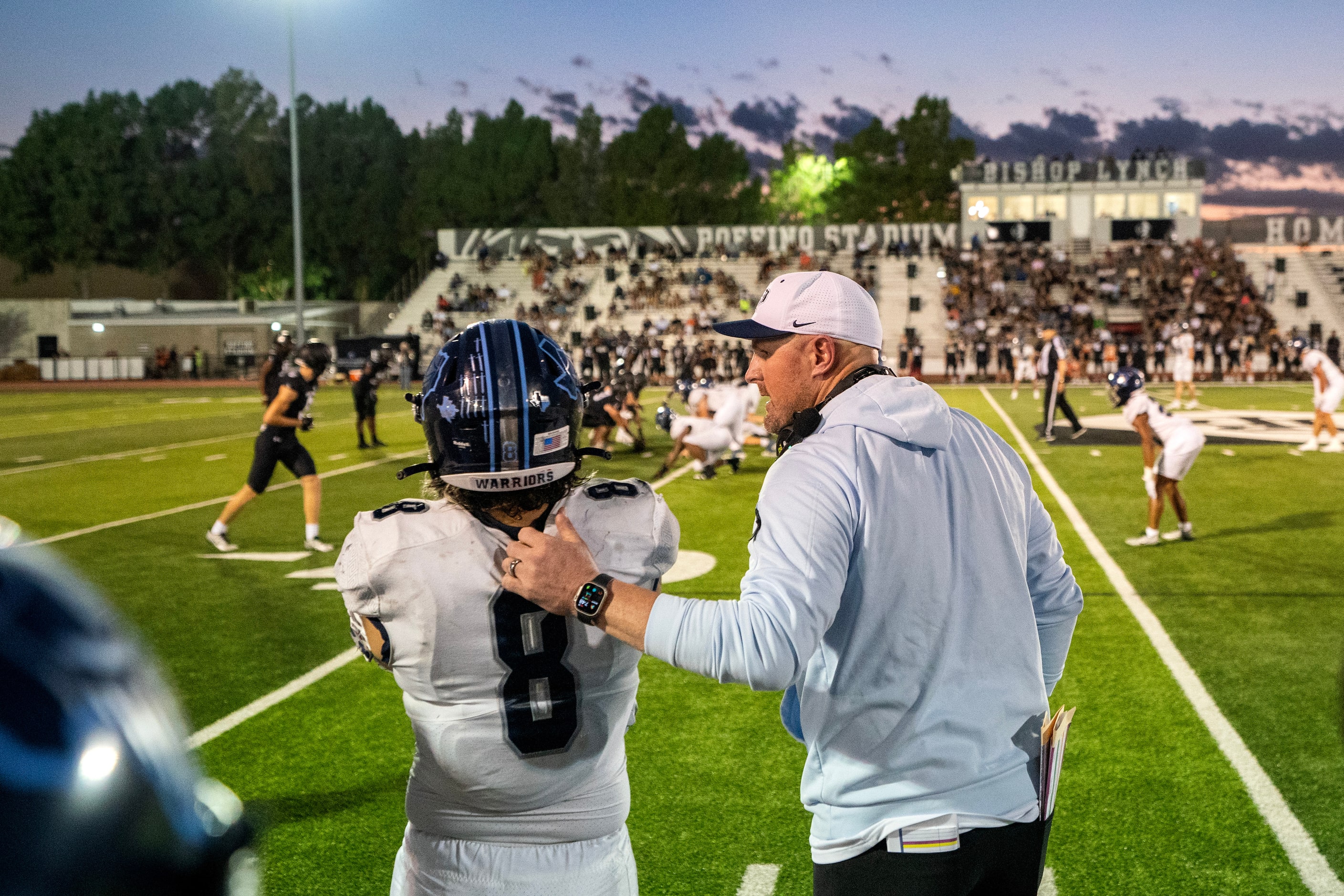 Former Dallas Cowboys great and Argyle Liberty Christian head coach Jason Witten talks to...