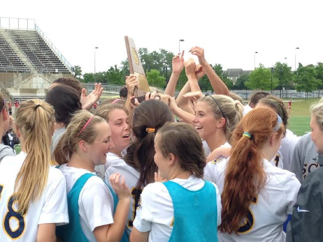 The Highland Park girls soccer team celebrates its victory over Rockwall in the Class 6A...