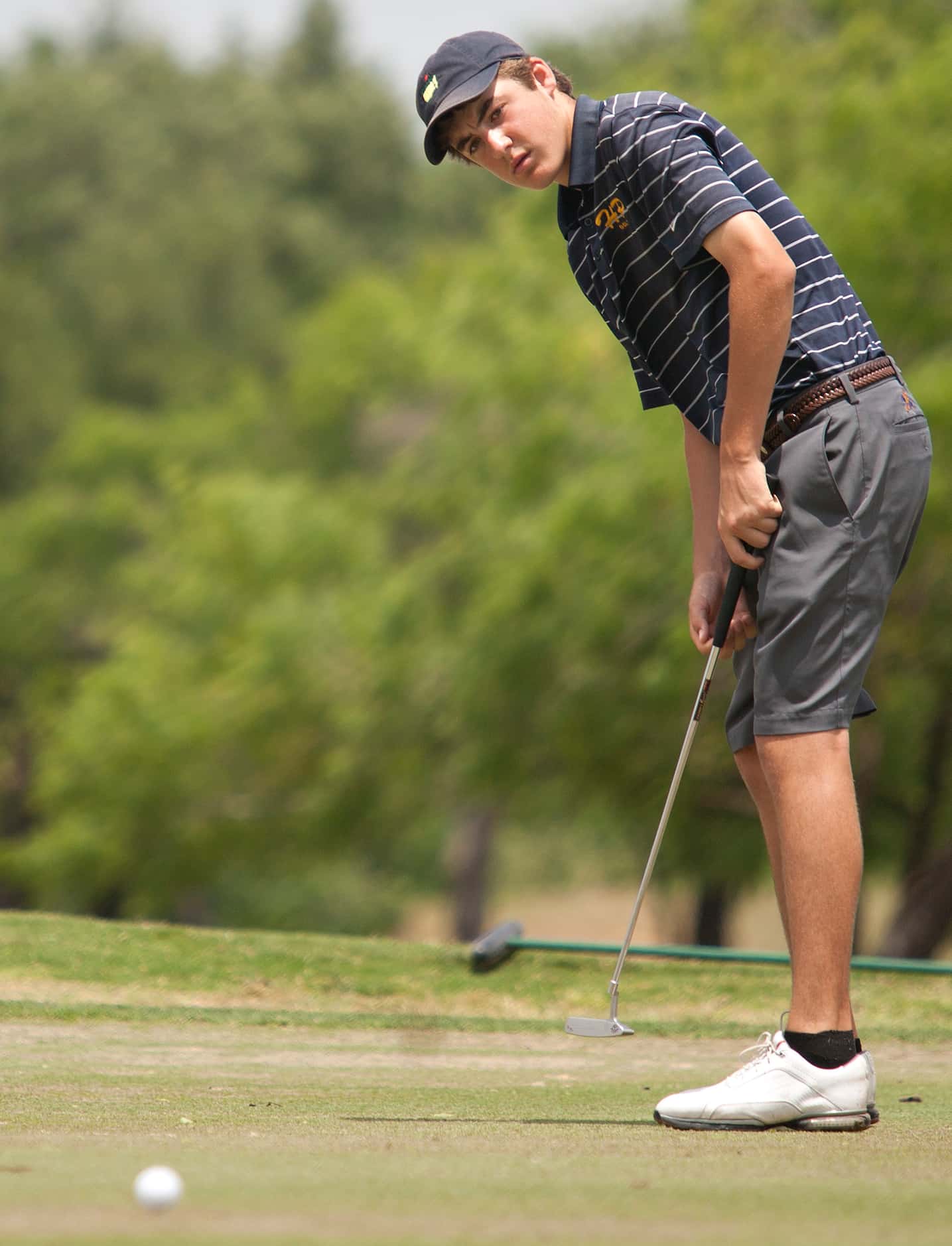 Scottie Scheffler of Highland Park watches his putt during the final round of the Class 4A...