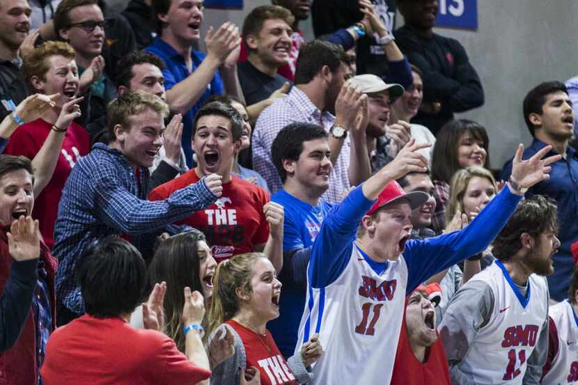 Southern Methodist Mustangs fans cheer during the second half of their game on Thursday,...