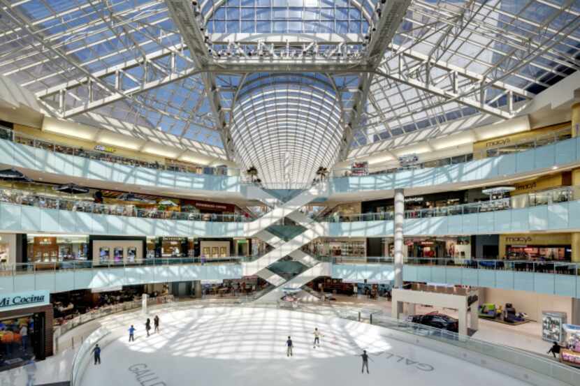 The ice rink is part of the ambiance at Galleria Dallas and differentiates the mall from...