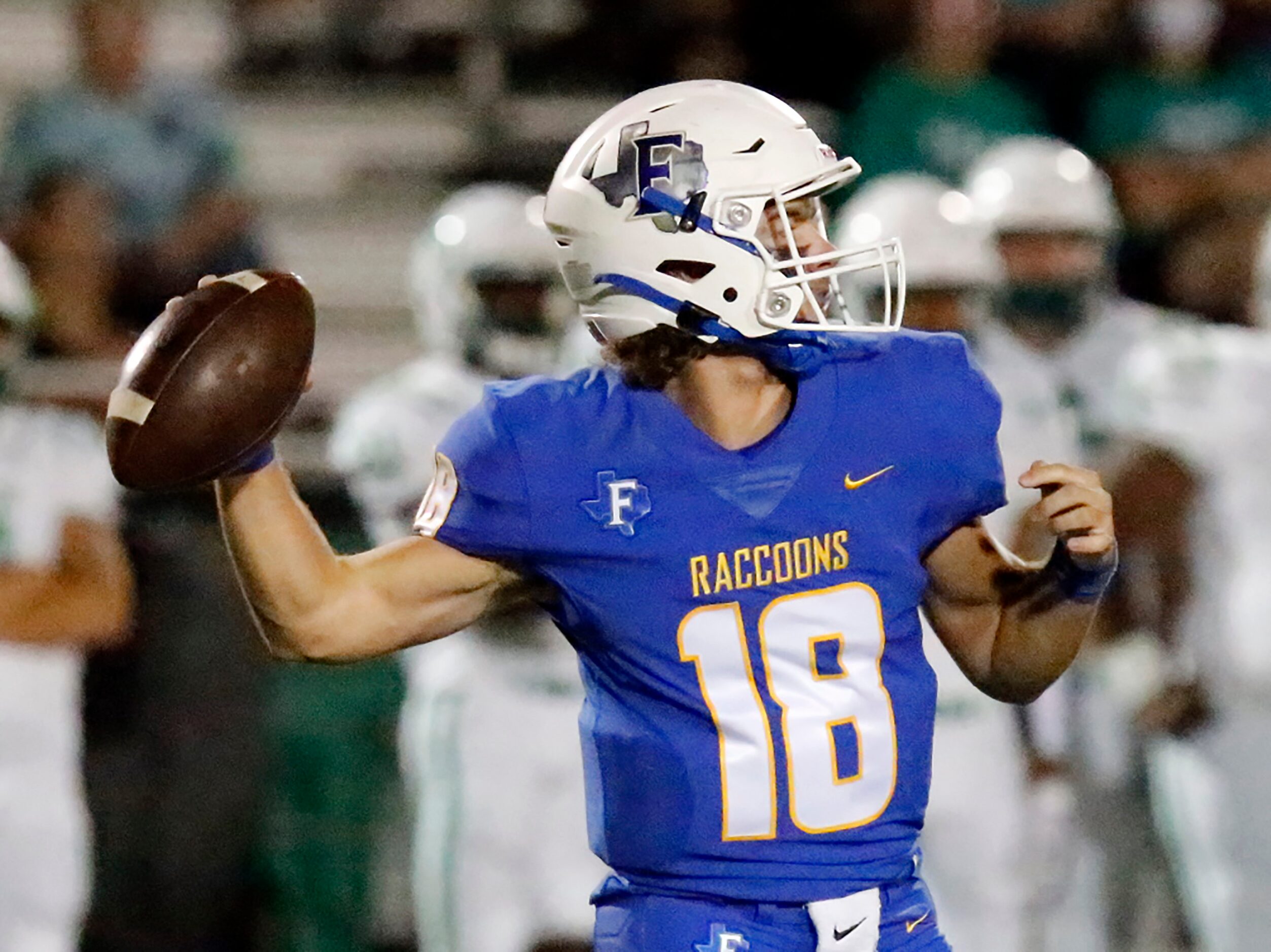 Frisco High School quarterback Wyatt Carson (18) during the first half as Frisco High School...