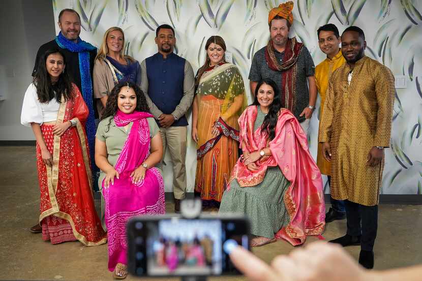 Employees posed for a group photo in traditional Indian attire during a  Heritage Festival...