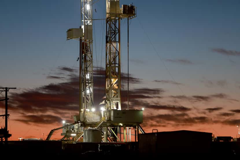 An oil drilling rig set up in the Permian Basin oil field on March 13, 2022, in Midland,...