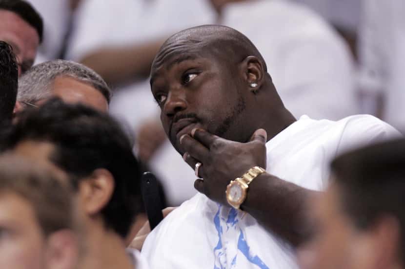 ORG XMIT: *S18DA5226* Warren Sapp watches during the first half of Game 4 of the NBA Finals...