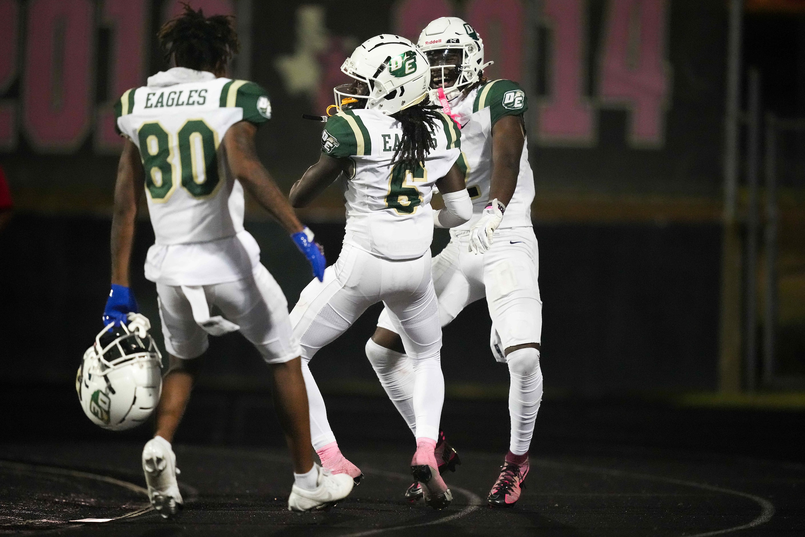 DeSoto defensive back Caleb Holmes (6) celebrates with wide receiver Jordan Marshall-Kelly...