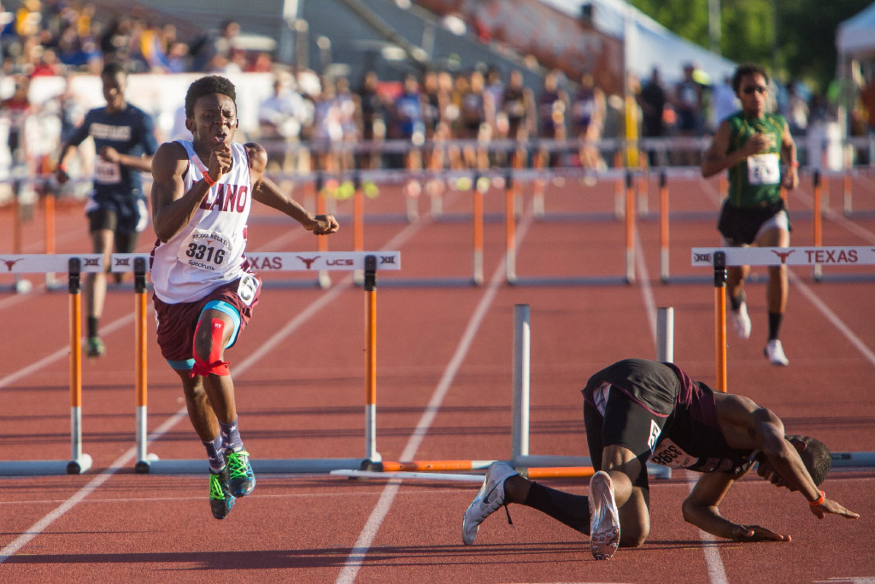 Rockwall-Heath's Nissi Kabongo gives the thumbs up after clearing her minimum height of the...