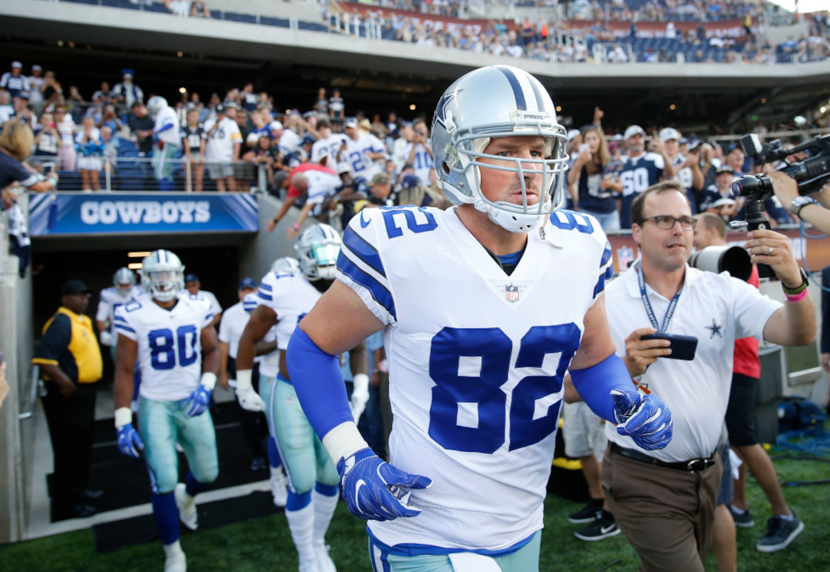 Dallas Cowboys tight end Jason Witten (82) wears a Salute to Service hat  before an NFL