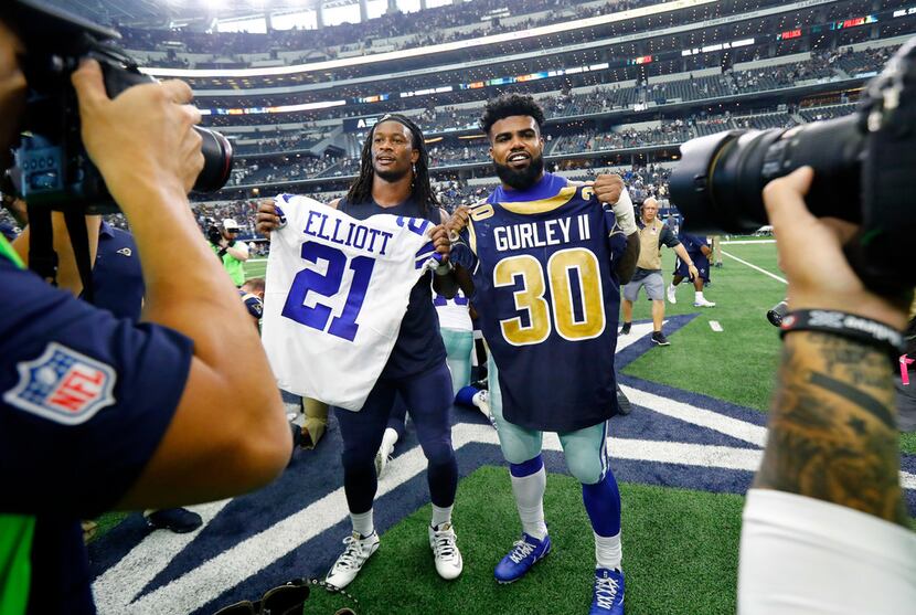 FILE - Cowboys running back Ezekiel Elliott (21) and Los Angeles Rams running back Todd...
