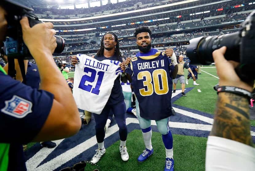 FILE - Cowboys running back Ezekiel Elliott (21) and Los Angeles Rams running back Todd...
