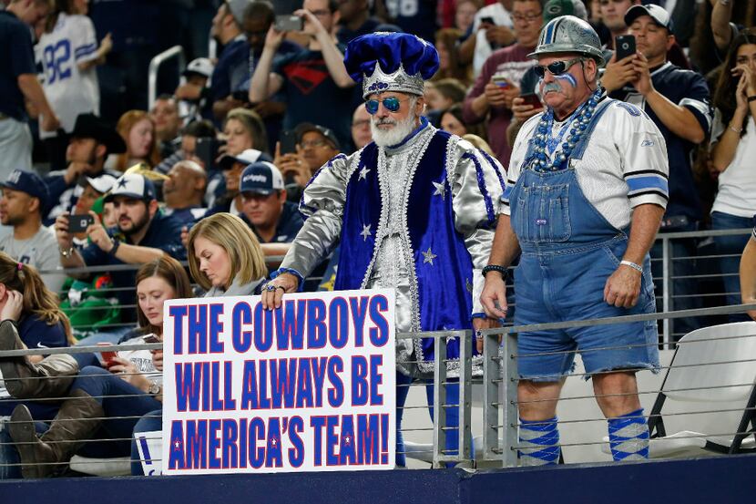 Dallas Cowboys fans watch the game against Detroit Lions at AT&T Stadium in Arlington,...